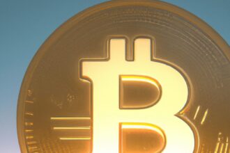 Технологии - Golden bitcoin coin shining brightly