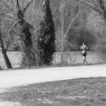 Разум и тело - Person jogging along scenic trail bl